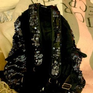 Black VS sequin backpack got it off here and rotating out it’s really cute